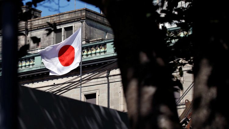 Japan's central bank sticks to economic recovery view despite rising global risks