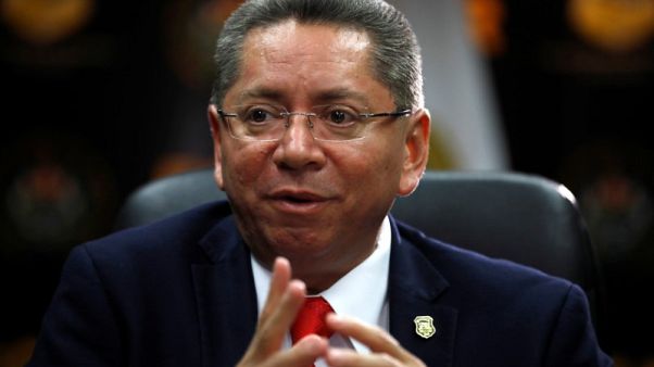 El Salvador's top cop pursues politicians; now some want him gone El Salvador's top cop pursues politicians; now some want him gone