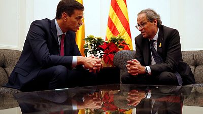 Spanish prime minister agrees with Catalan leader on easing political tension