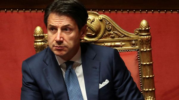 Moderates emerge from populist shadows to shape Italian budget deal Moderates emerge from populist shadows to shape Italian budget deal