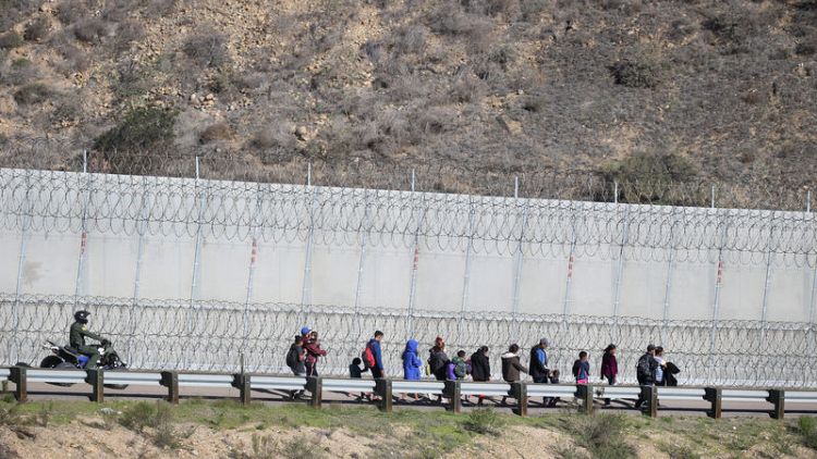 U.S. to send migrants back to Mexico to wait out asylum requests