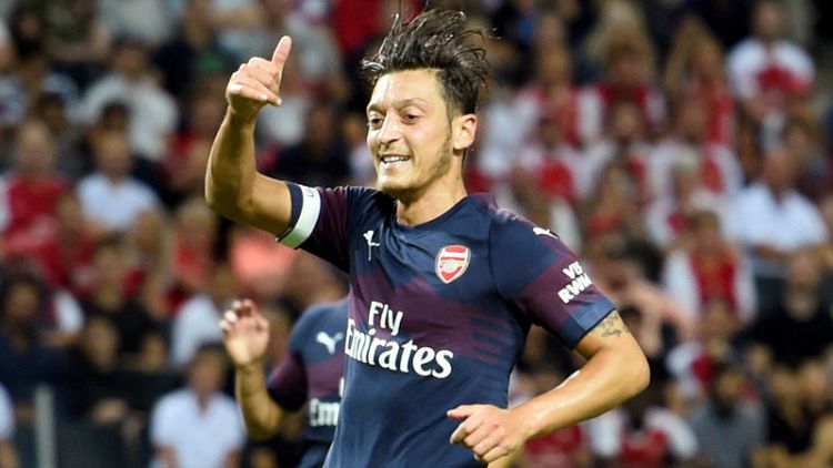 Arsenal's Emery changes tune and says: 'We need Ozil'