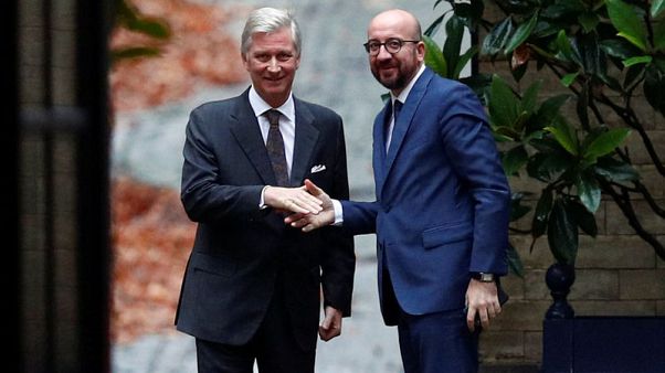 Belgian PM to stay on heading caretaker government Belgian PM to stay on heading caretaker government