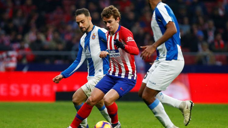 Griezmann penalty gives Atletico win in tight game with Espanyol