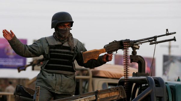 Gunmen kill at least 28 in raid on Afghan government building Gunmen kill at least 28 in raid on Afghan government building