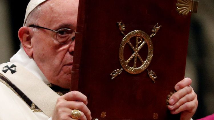 Remember the poor and shun materialism, pope says on Christmas Eve
