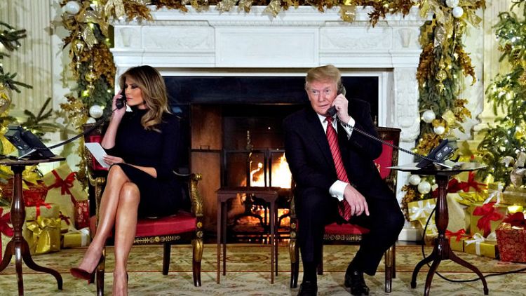 During gloomy Washington Christmas, Trump takes kids' Santa calls