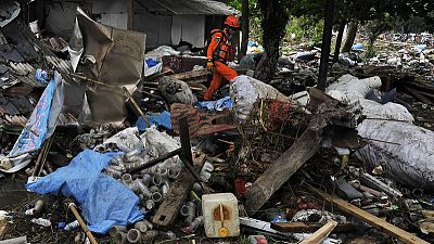 Indonesian rescuers use drones as tsunami death toll tops 400