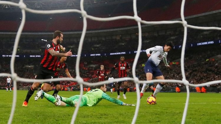Super Spurs rout Bournemouth to move up to second