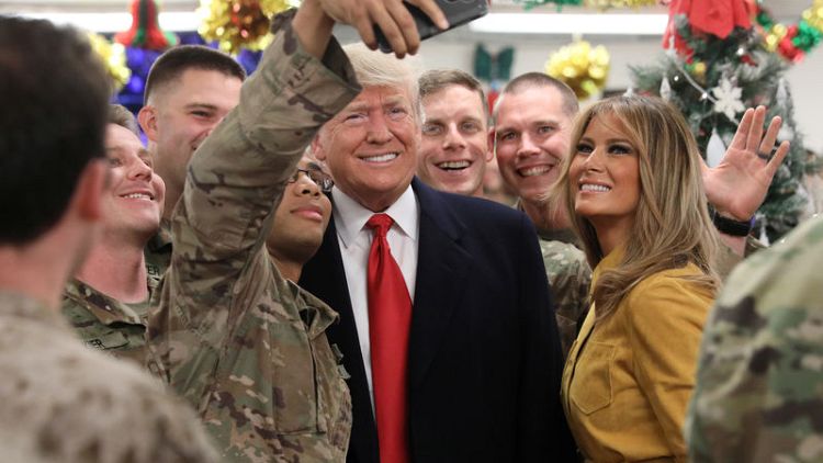 In a first, Trump makes surprise visit to U.S. troops in Iraq