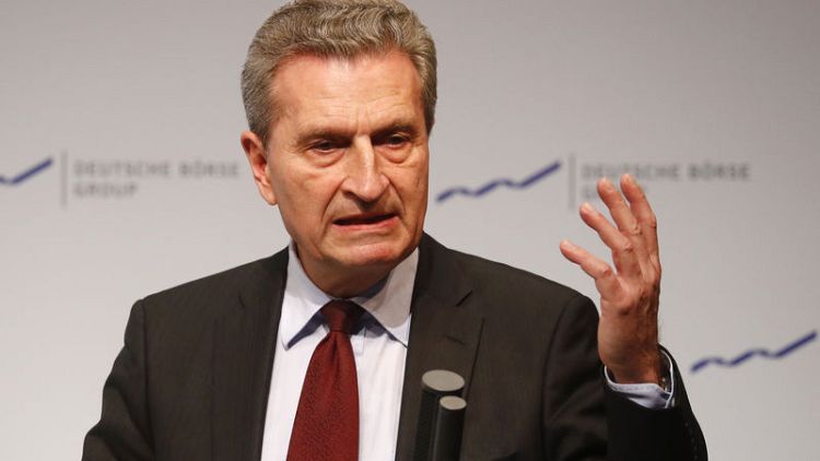 EU's Oettinger urges France to push budget deficit below 3 percent from 2020