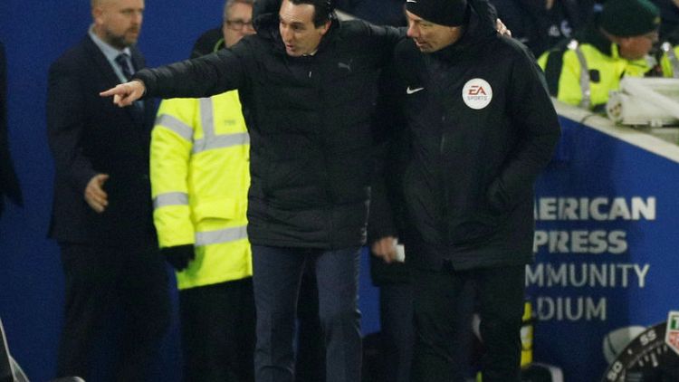 Arsenal's Emery charged over kicking bottle at fan
