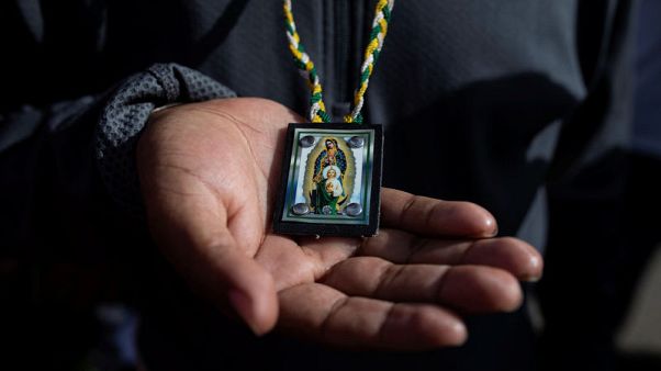 For many migrants trekking to the U.S., faith is their compass For many migrants trekking to the U.S., faith is their compass