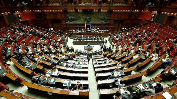 Italian parliament passes budget in confidence vote, after EU deal Italian parliament passes budget in confidence vote, after EU deal