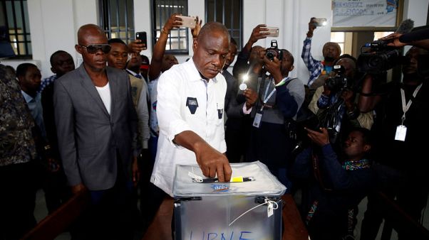 Storms, delays blight start to Congo's presidential vote Storms, delays blight start to Congo's presidential vote