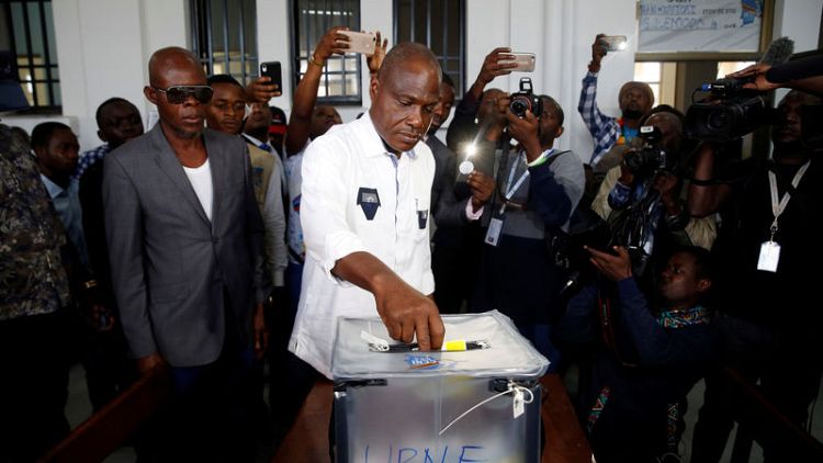 Storms, delays blight start to Congo's presidential vote