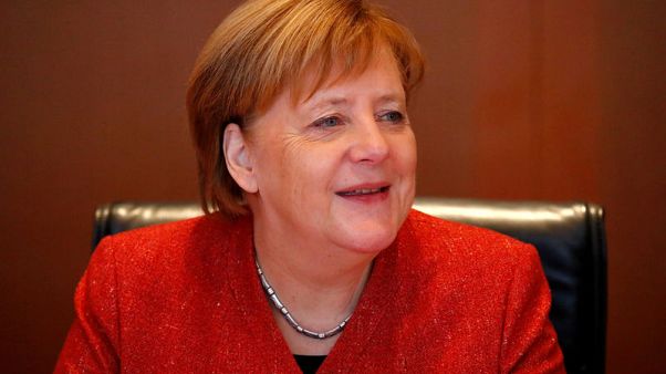 Merkel urges divided Germans to pull together in 2019 Merkel urges divided Germans to pull together in 2019