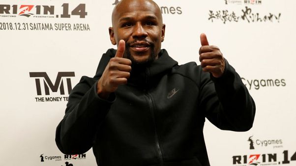 Mayweather blitzes Tenshin in Japanese boxing exhibition Mayweather blitzes Tenshin in Japanese boxing exhibition