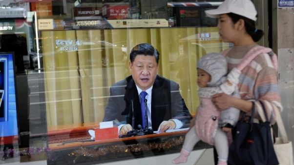Xi Jinping intransigeant face à Taïwan, vouée à la "réunification" Xi Jinping intransigeant face à Taïwan, vouée à la "réunification"