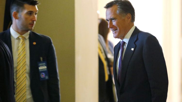 Romney attacks Trump, saying he causes dismay around the world