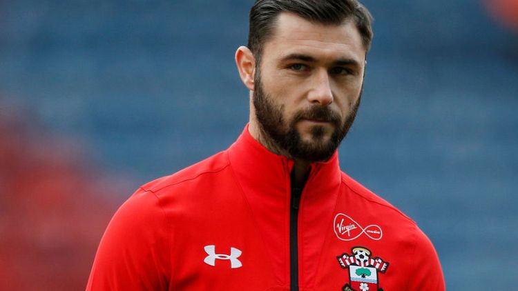 Southampton's Austin charged for gesture at Man City fans