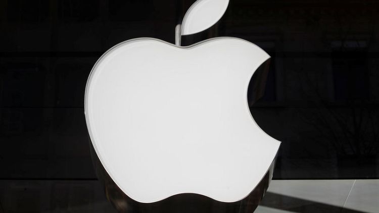 Apple shares slide after iPhone maker issues rare revenue warning