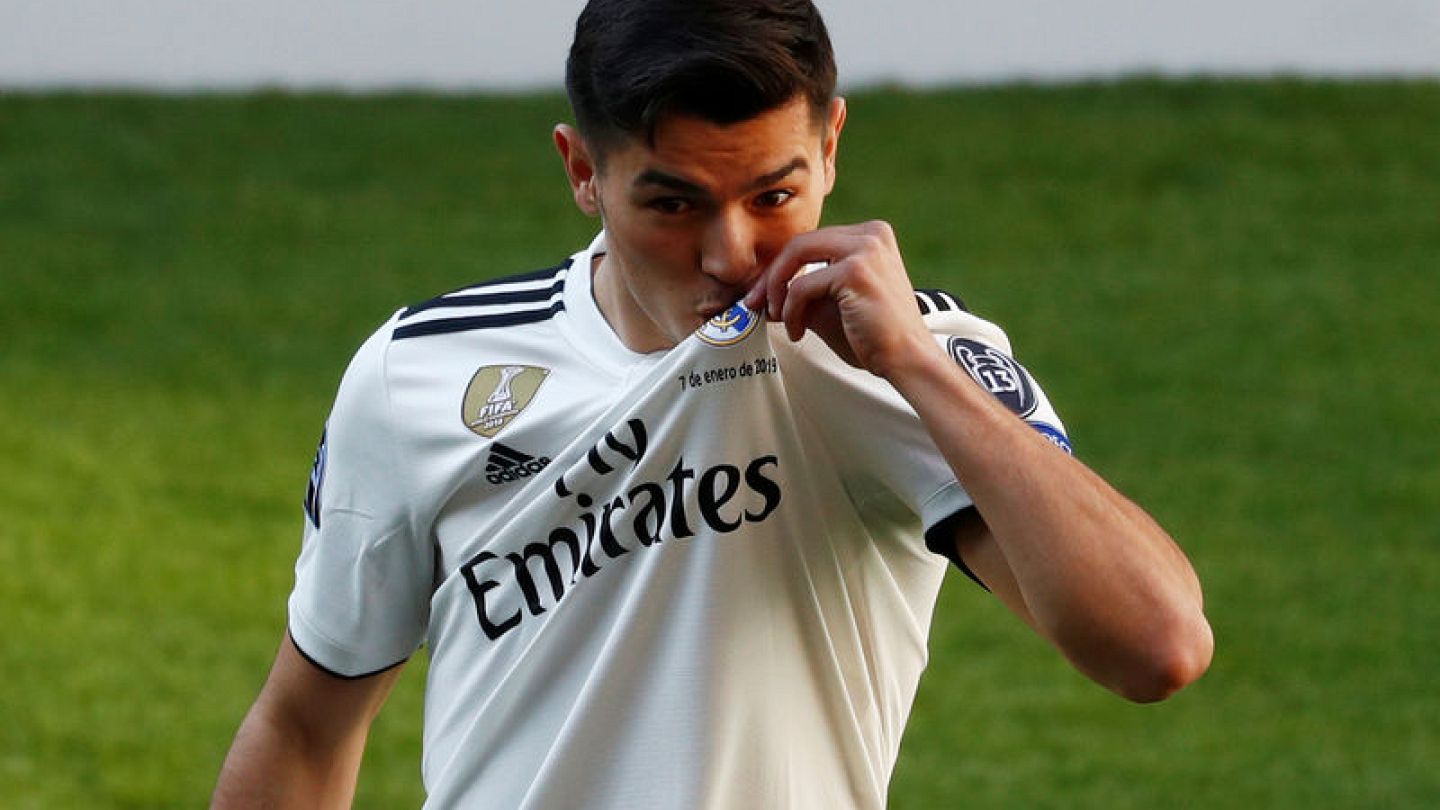 Brahim poses in the Real Madrid jersey