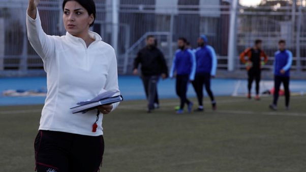Woman coach scores wins for Syrian men's team Woman coach scores wins for Syrian men's team