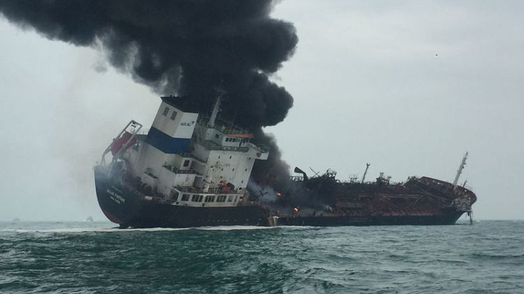 Oil tanker fire in Hong Kong waters kills one, rescue going on