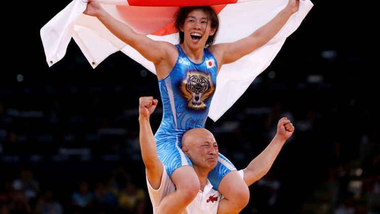 Triple Olympic gold medallist Yoshida retires