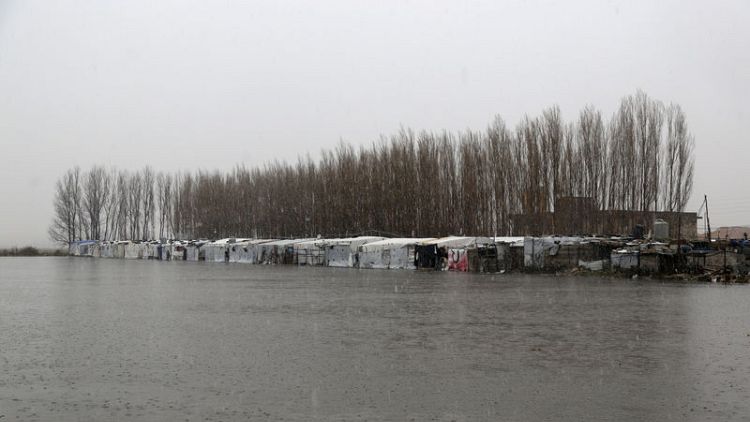 Lebanon's winter storm freezes refugees in flooded camps