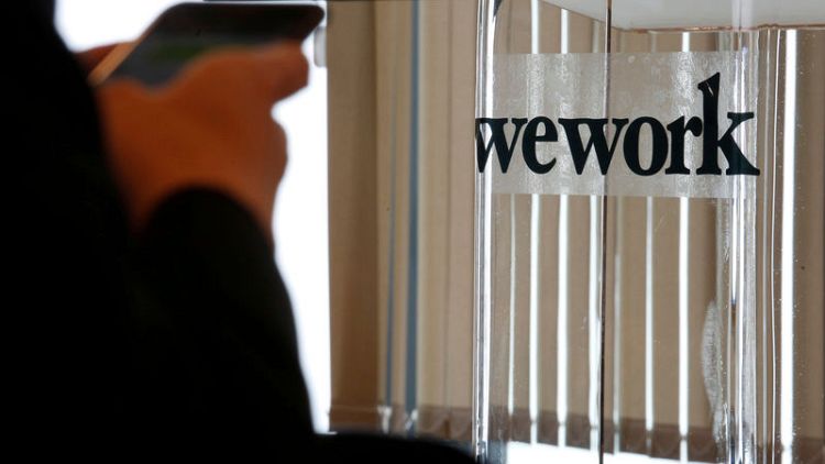 WeWork gets $2 billion in new funds from SoftBank, changes name