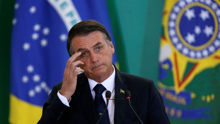 New Brazil government riven by divisions, policy confusion