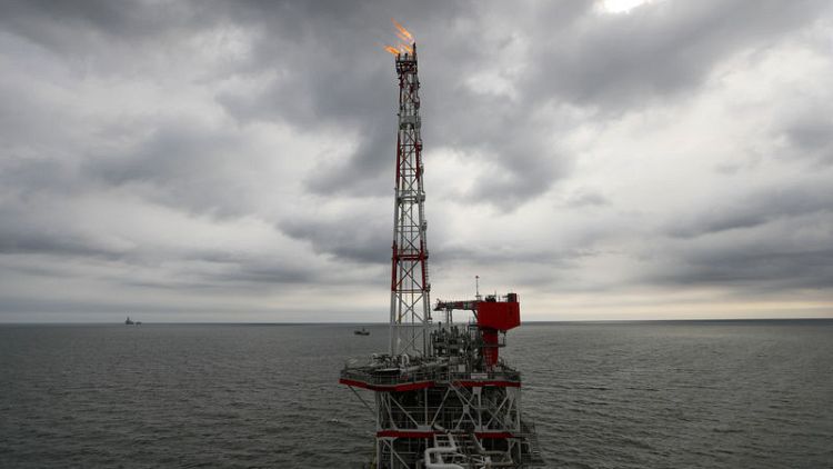 Oil up more than four percent on U.S.-China trade talk hopes, OPEC cuts
