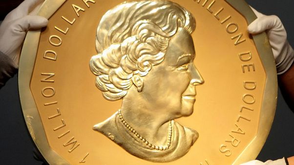 Four men go on trial for theft of giant gold coin from Berlin museum Four men go on trial for theft of giant gold coin from Berlin museum