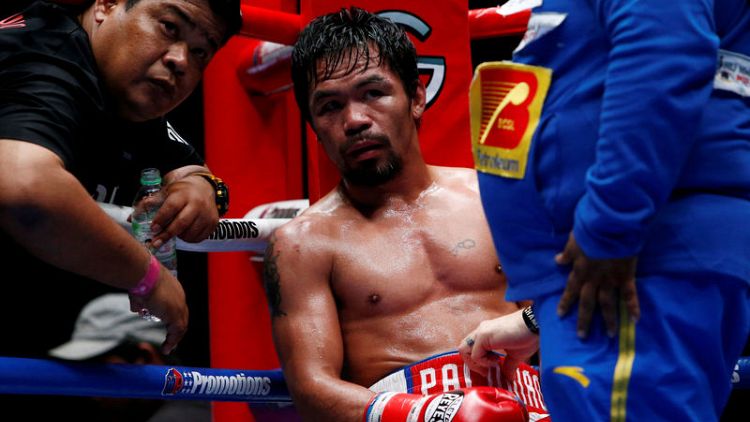 Boxing - Pacquiao takes jab at Mayweather over New Year's Eve cakewalk