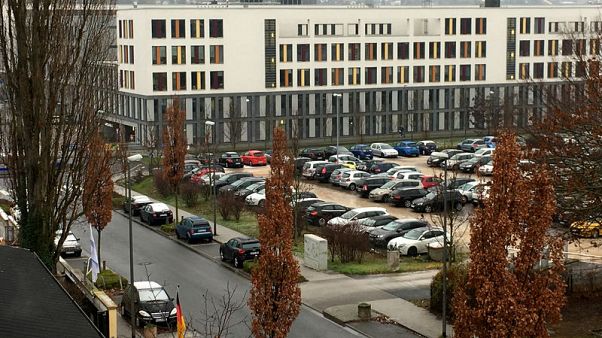 Police evacuate at least six German courts after bomb threats Police evacuate at least six German courts after bomb threats