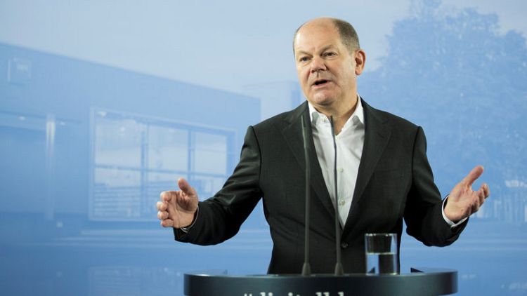 German Finance Minister open to merger of big German banks - newspaper