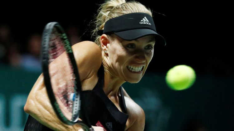 Kerber feels solid again with new coach Schuettler