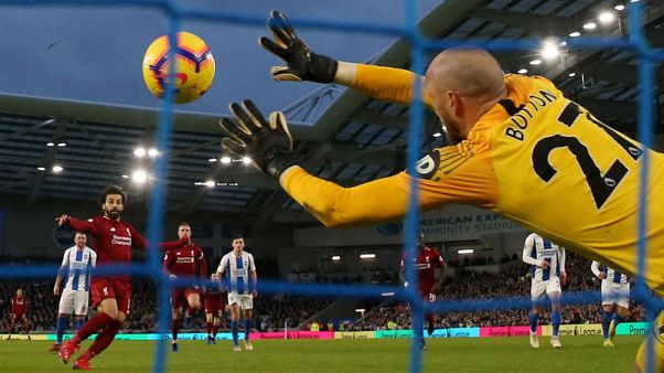 Salah penalty keeps Liverpool in driving seat Salah penalty keeps Liverpool in driving seat