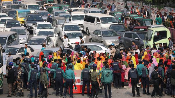 Bangladesh factory owners threaten to cut off pay to protesting workers Bangladesh factory owners threaten to cut off pay to protesting workers
