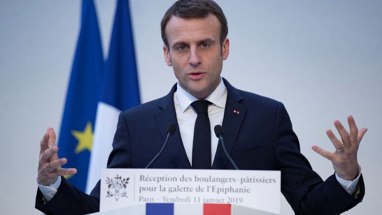 With 2,300-word letter, Macron launches debate to quell 'yellow vest' unrest