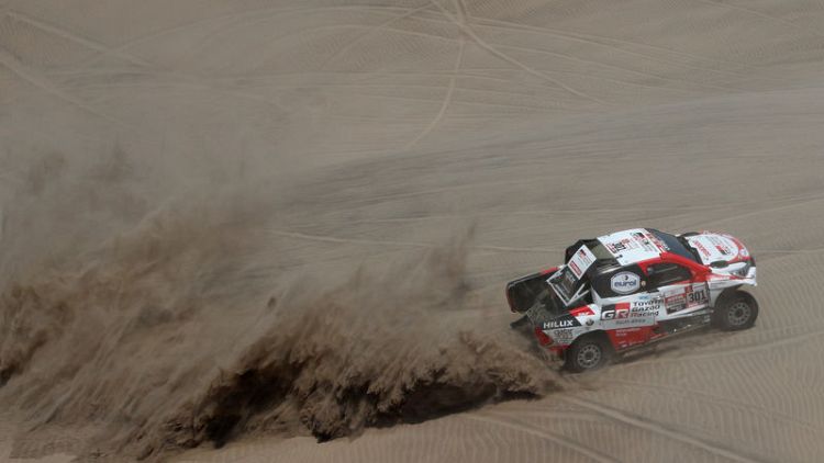 Rallying - Loeb wins another stage as Al-Attiyah stretches Dakar lead
