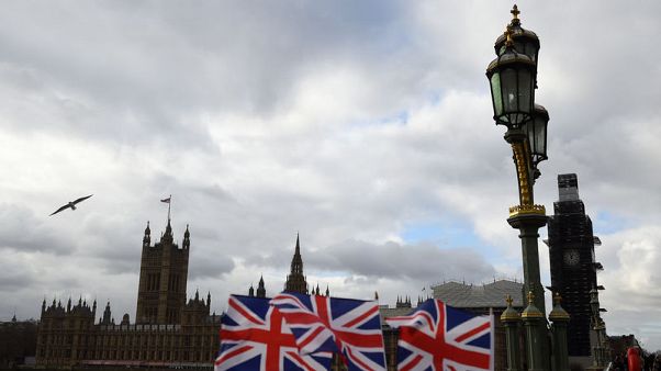 UK parliament to reject May's EU divorce deal, say economists UK parliament to reject May's EU divorce deal, say economists