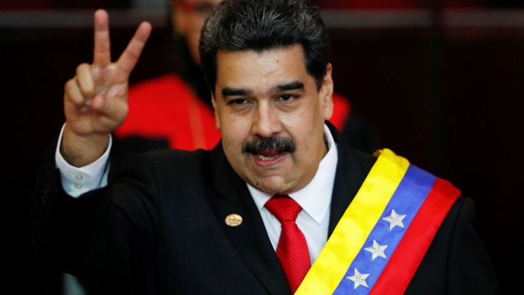 Venezuela's Maduro hikes minimum wage as economy struggles