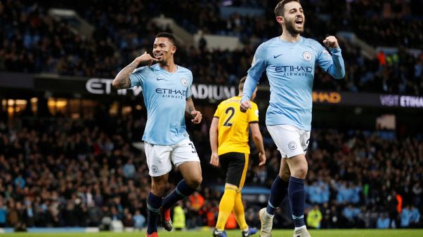 Man City ease past 10-man Wolves to cut gap at top Man City ease past 10-man Wolves to cut gap at top