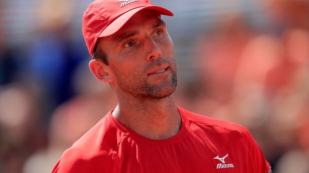 Karlovic, 39, defies Father Time to reach second round Karlovic, 39, defies Father Time to reach second round
