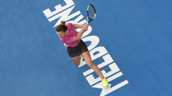 Determined Halep survives Kanepi hurdle to reach second round Determined Halep survives Kanepi hurdle to reach second round