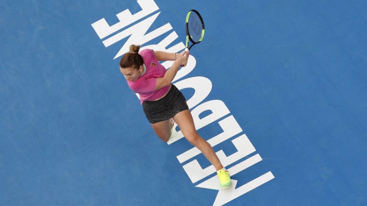 Determined Halep survives Kanepi hurdle to reach second round