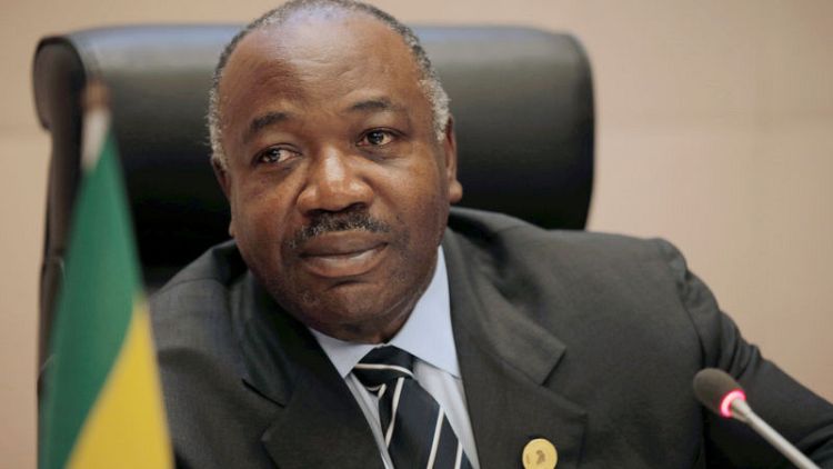 Back from medical leave, Gabon president appears in wheelchair